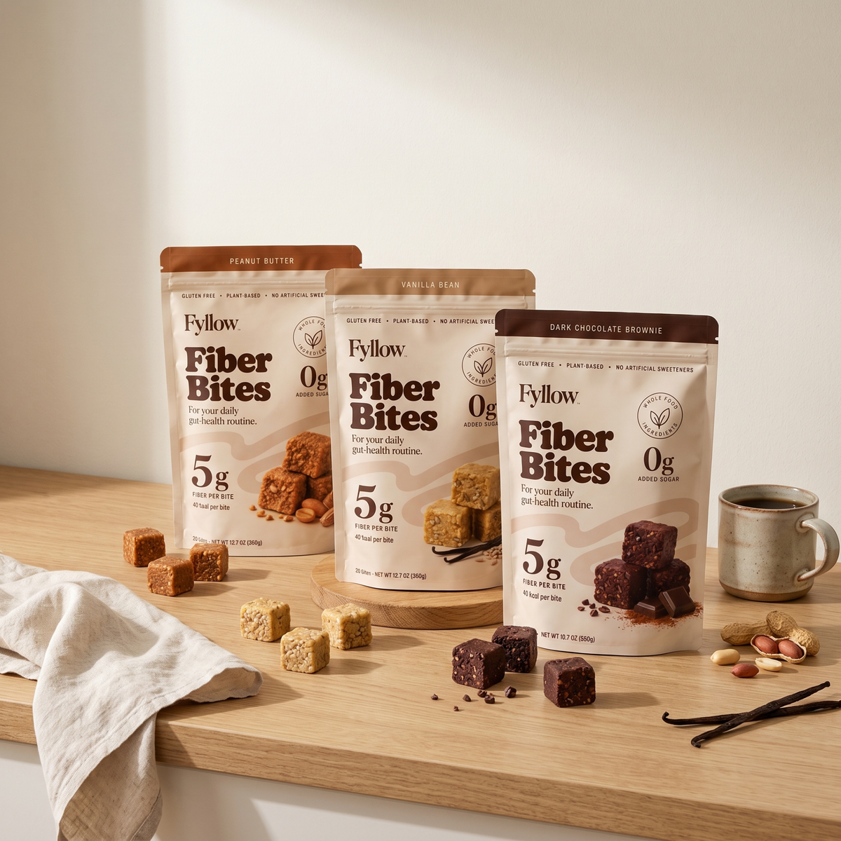 Fyllow Fiber Bites: all three flavors, Peanut Butter, Vanilla Bean and Dark Chocolate Brownie, on a kitchen counter.