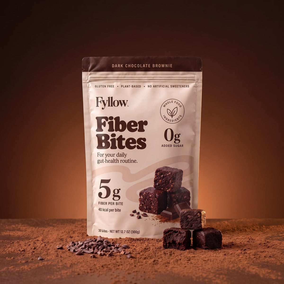Dark Chocolate Brownie Fiber Bites on a cocoa backdrop