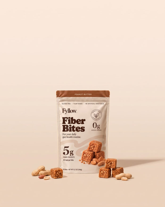 Peanut Butter Fiber Bites packshot on champagne